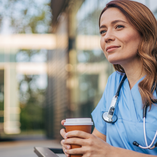 Nurse with holding cup
